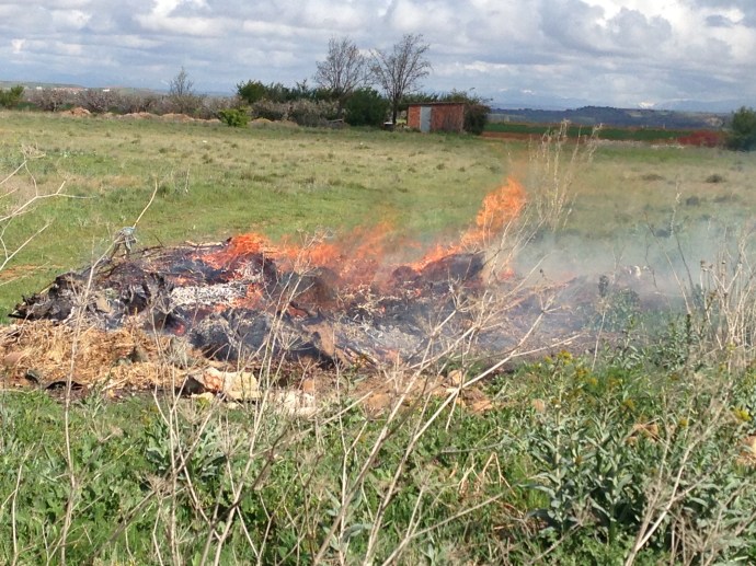 Fire burning in a field, en route to Mansilla de las Mulas
